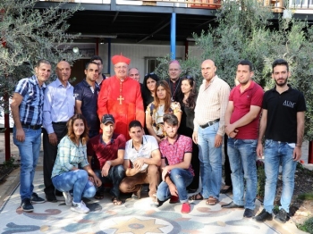 Cardinal Leonardo Sandri and Caritas team in Jordan